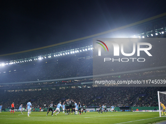 Phil Foden of Manchester City takes a shot during the UEFA Champions League match between Sporting CP and Manchester City at Jose Alvalade S...