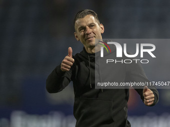 Wycombe Wanderers F.C. manager Matt Bloomfield salutes the fans at full time during the Sky Bet League 1 match between Stockport County and...