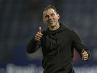 Wycombe Wanderers F.C. manager Matt Bloomfield salutes the fans at full time during the Sky Bet League 1 match between Stockport County and...