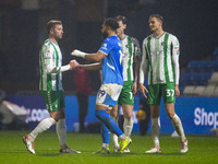 Players shake hands at full time during the Sky Bet League 1 match between Stockport County and Wycombe Wanderers at the Edgeley Park Stadiu...