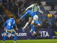 Odin Bailey #27 of Stockport County F.C. engages in an aerial challenge with an opponent during the Sky Bet League 1 match between Stockport...