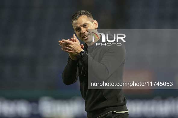 Wycombe Wanderers F.C. manager Matt Bloomfield salutes the fans at full time during the Sky Bet League 1 match between Stockport County and...