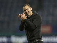 Wycombe Wanderers F.C. manager Matt Bloomfield salutes the fans at full time during the Sky Bet League 1 match between Stockport County and...