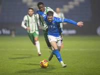 Ethan Pye #15 of Stockport County F.C. is tackled by Beryly Lubala #30 of Wycombe Wanderers F.C. during the Sky Bet League 1 match between S...