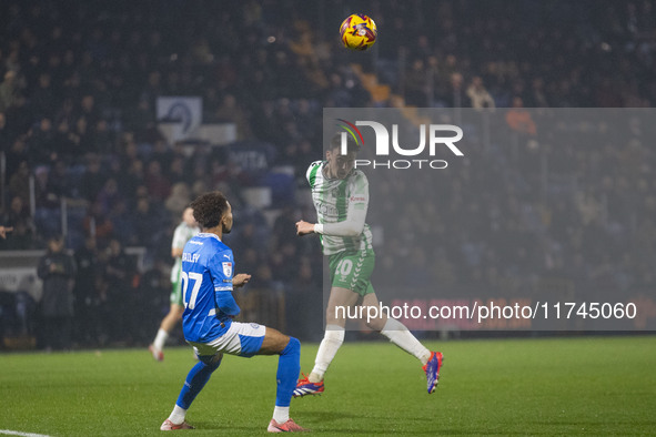 Cameron Humphreys #20 of Wycombe Wanderers F.C. heads the ball during the Sky Bet League 1 match between Stockport County and Wycombe Wander...