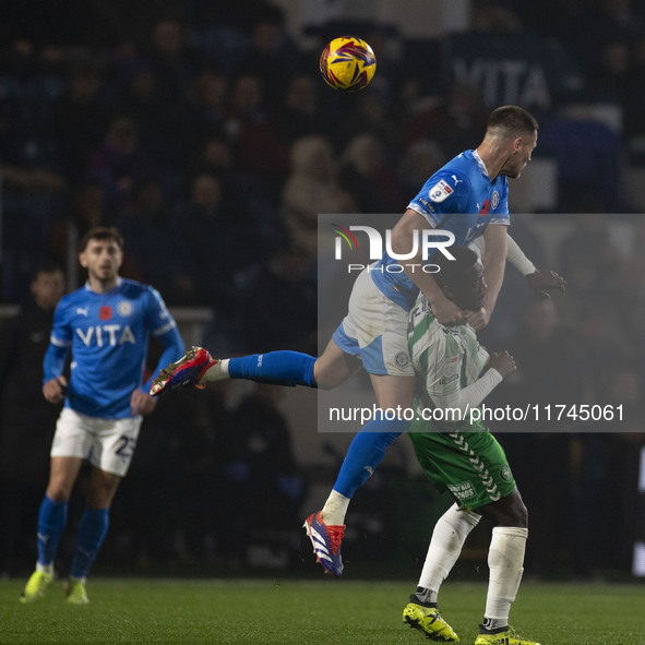 Fraser Horsfall #6 of Stockport County F.C. heads the ball during the Sky Bet League 1 match between Stockport County and Wycombe Wanderers...