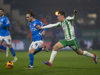 Lewis Bate, #4 of Stockport County F.C., is challenged by Cameron Humphreys, #20 of Wycombe Wanderers F.C., during the Sky Bet League 1 matc...