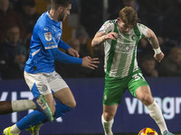 Jasper Pattenden, 31, of Wycombe Wanderers F.C. is tackled by the opponent during the Sky Bet League 1 match between Stockport County and Wy...