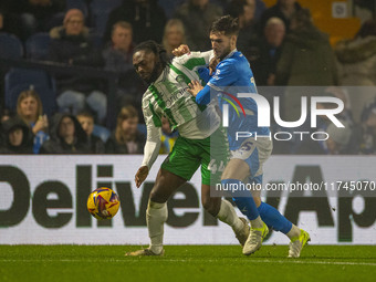 Fred Onyedinma #44 of Wycombe Wanderers F.C. is challenged by an opponent during the Sky Bet League 1 match between Stockport County and Wyc...