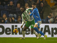 Fred Onyedinma #44 of Wycombe Wanderers F.C. is challenged by an opponent during the Sky Bet League 1 match between Stockport County and Wyc...