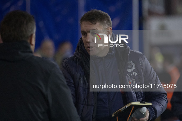 Stockport County F.C. manager Dave Challinor shakes hands with Wycombe Wanderers F.C. manager Matt Bloomfield during the Sky Bet League 1 ma...