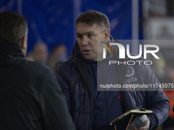 Stockport County F.C. manager Dave Challinor shakes hands with Wycombe Wanderers F.C. manager Matt Bloomfield during the Sky Bet League 1 ma...