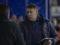 Stockport County F.C. manager Dave Challinor shakes hands with Wycombe Wanderers F.C. manager Matt Bloomfield during the Sky Bet League 1 ma...