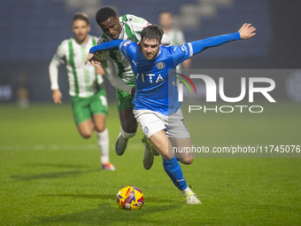 Ethan Pye #15 of Stockport County F.C. is tackled by Beryly Lubala #30 of Wycombe Wanderers F.C. during the Sky Bet League 1 match between S...