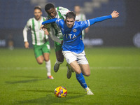 Ethan Pye #15 of Stockport County F.C. is tackled by Beryly Lubala #30 of Wycombe Wanderers F.C. during the Sky Bet League 1 match between S...