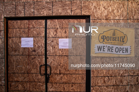 A Potbelly sandwich shop near the White House is completely boarded up in the event of violence following today's election for president in...