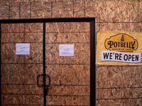 A Potbelly sandwich shop near the White House is completely boarded up in the event of violence following today's election for president in...