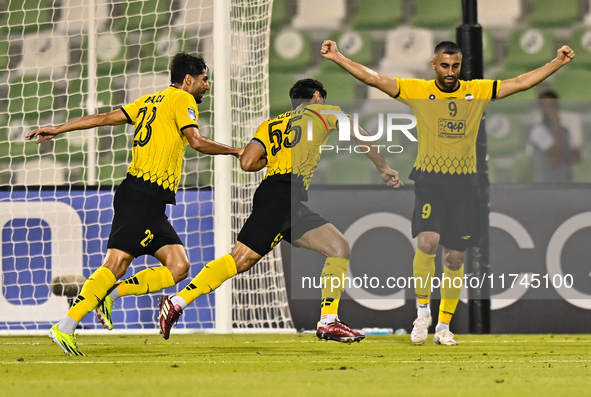 Amin Hazbavi (C) of Asepahan SC celebrates with his teammates after scoring a goal during the AFC Champions League Two Group A football matc...