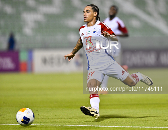 Guilherme Cunha of Sharjah FC plays in the AFC Champions League Two Group A football match between United Arab Emirates' Sharjah FC and Iran...