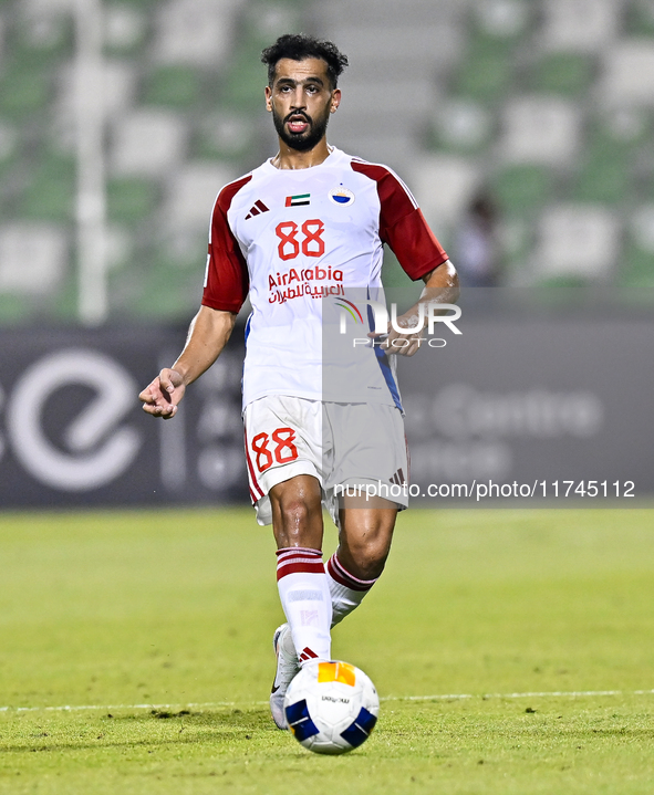 Majed Hassan Alahmadi of Sharjah FC plays in the AFC Champions League Two Group A football match between United Arab Emirates' Sharjah FC an...