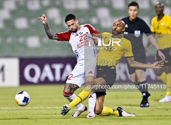 Steven Nzonzi (R) of Sepahan SC battles for the ball with Marcus Vinicius of Sharjah FC during the AFC Champions League Group A football mat...