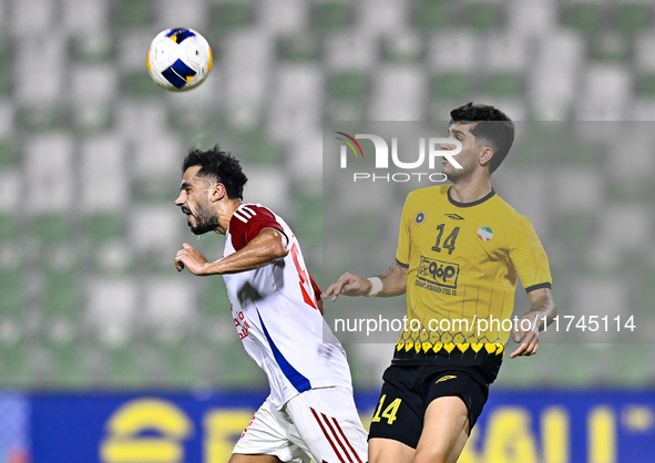 Arya Yousefi of Sepahan SC battles for the ball with Majed Hassan Alahmadi of Sharjah FC during the AFC Champions League Group A football ma...