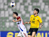 Arya Yousefi of Sepahan SC battles for the ball with Majed Hassan Alahmadi of Sharjah FC during the AFC Champions League Group A football ma...