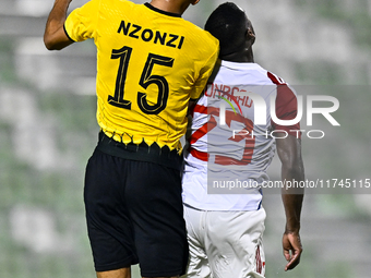 Steven Nzonzi of Sepahan SC battles for the ball with Tyrone Conraad of Sharjah FC during the AFC Champions League Group A football match be...