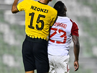 Steven Nzonzi of Sepahan SC battles for the ball with Tyrone Conraad of Sharjah FC during the AFC Champions League Group A football match be...