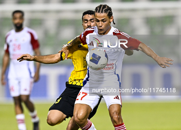 Seyed Mohammad Karimi of Asepahan SC battles for the ball with Guilherme Cunha of Sharjah FC during the AFC Champions League Two Group A foo...