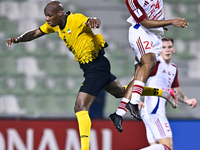 Bryan Dabo of Sepahan SC battles for the ball with Majid Rashid Almehrzi of Sharjah FC during the AFC Champions League Group A football matc...