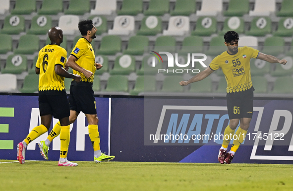 Amin Hazbavi of Asepahan SC celebrates with his teammates after scoring a goal during the AFC Champions League Two Group A football match be...