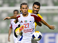 Seyed Mohammad Karimi of Asepahan SC battles for the ball with Guilherme Cunha of Sharjah FC during the AFC Champions League Two Group A foo...