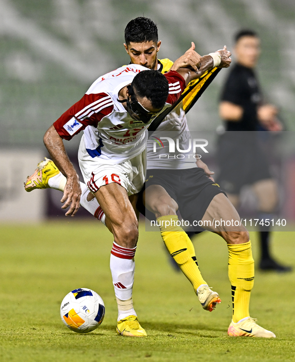 Mehdi Lamouchi of Sepahan SC battles for the ball with Khaled Ebraheim Aldhanhani of Sharjah FC during the AFC Champions League Group A foot...