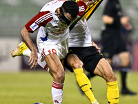 Mehdi Lamouchi of Sepahan SC battles for the ball with Khaled Ebraheim Aldhanhani of Sharjah FC during the AFC Champions League Group A foot...