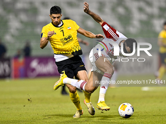 Mehdi Lamouchi of Sepahan SC battles for the ball with Khaled Ebraheim Aldhanhani of Sharjah FC during the AFC Champions League Group A foot...