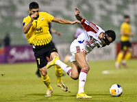 Mehdi Lamouchi of Sepahan SC battles for the ball with Khaled Ebraheim Aldhanhani of Sharjah FC during the AFC Champions League Group A foot...