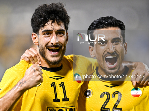 Javad Aghaeipour (L) of Sepahan SC celebrates with his teammates after scoring a goal during the AFC Champions League Group A football match...