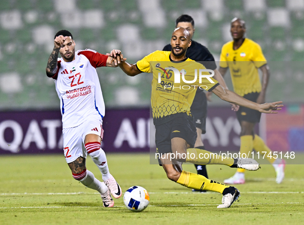 Steven Nzonzi of Asepahan SC battles for the ball with Marcus Vinicius of Sharjah FC during the AFC Champions League Two Group A football ma...