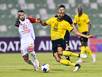 Steven Nzonzi of Asepahan SC battles for the ball with Marcus Vinicius of Sharjah FC during the AFC Champions League Two Group A football ma...