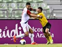 Saleh Hardani of Sepahan SC battles for the ball with Luan Pereira of Sharjah FC during the AFC Champions League Group A football match betw...