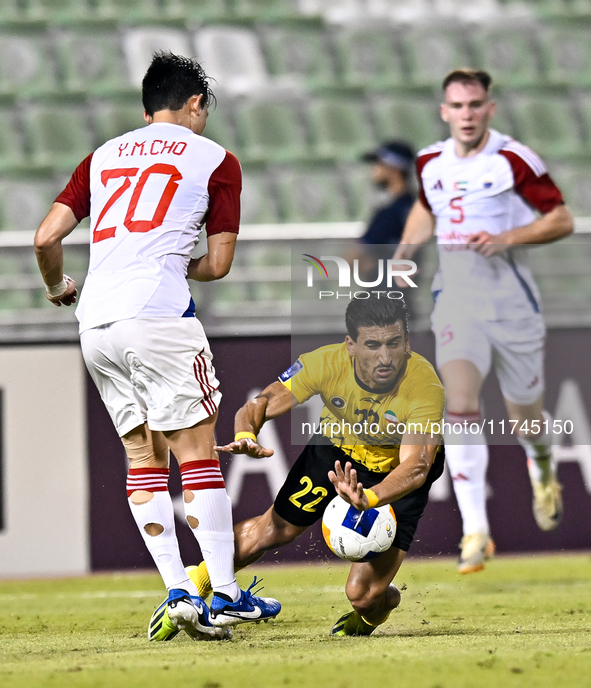 Saleh Hardani of Sepahan SC battles for the ball with Cho Yumin of Sharjah FC during the AFC Champions League Group A football match between...