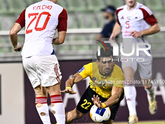 Saleh Hardani of Sepahan SC battles for the ball with Cho Yumin of Sharjah FC during the AFC Champions League Group A football match between...