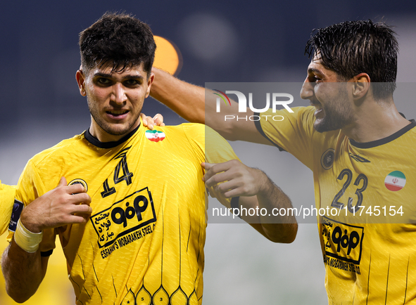 Aria Yousefi (L) of Asepahan SC celebrates with his teammates after scoring a goal during the AFC Champions League Two Group A football matc...