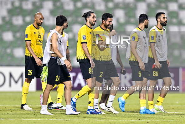 Players of Sepahan SC celebrate after winning the AFC Champions League Group A football match between United Arab Emirates' Sharjah FC and I...