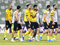 Players of Sepahan SC celebrate after winning the AFC Champions League Group A football match between United Arab Emirates' Sharjah FC and I...