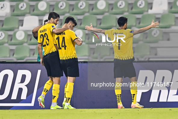 Aria Yousefi (C) of Asepahan SC celebrates with his teammates after scoring a goal during the AFC Champions League Two Group A football matc...