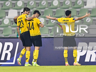 Aria Yousefi (C) of Asepahan SC celebrates with his teammates after scoring a goal during the AFC Champions League Two Group A football matc...