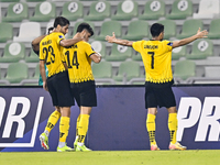 Aria Yousefi (C) of Asepahan SC celebrates with his teammates after scoring a goal during the AFC Champions League Two Group A football matc...