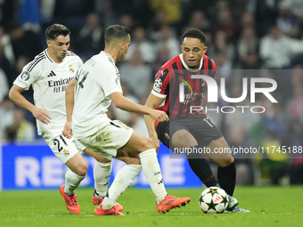 Noah Okafor left Winger of AC Milan and Switzerland during the UEFA Champions League 2024/25 League Phase MD4 match between Real Madrid C.F....